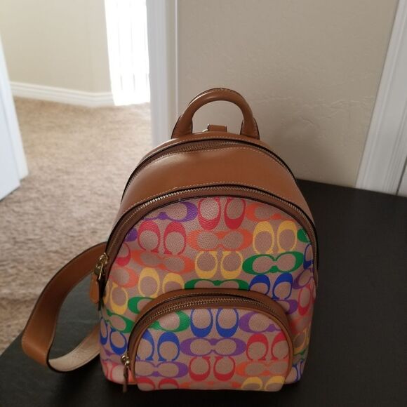 coach backpack rainbow Women's Mini Court in Signature Canvas, Signature coated canvas and smooth leather Inside zip and multifunction pockets Double zip closure fabric lining Handle with 2 1/4 drop Outside zip pocket Adjustable shoulder straps 10 3/4 (L) x 12 1/2 (H) x 4 3/4 (W) The Coach Foundation continues to partner with the Hetrick Coach Rainbow Backpack